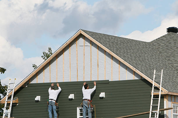 Professional Siding Installation technician working in Clear Brook, VA